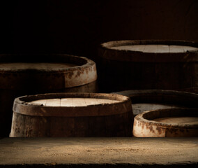 Old wooden barrel on a brown background