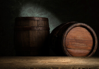 Old wooden barrel on a brown background