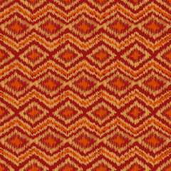 Zigzag ethnic geometric seamless pattern with rhombic brushstrokes. Ornamental tribal texture in red and beige colors