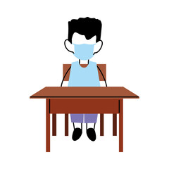boy with face mask at school desk