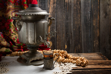 Russian traditional tea-drinking: a samovar, drying and tea in cup holder