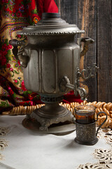 Russian traditional tea-drinking: a samovar, drying and tea in cup holder