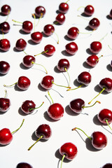 Ripe sweet cherries isolated on white background.