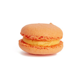 orange round baked macaron isolated on a white background