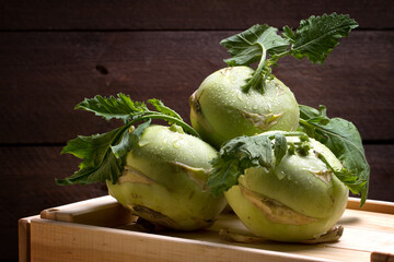 Kohlrabi cabbage on a wooden box
