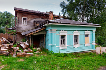 Fototapeta na wymiar Abandoned old wooden village house