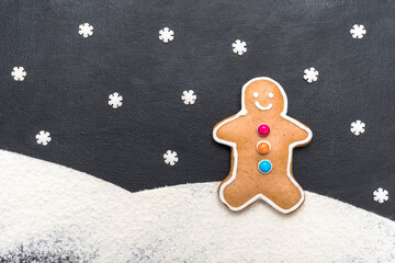 Weihnachtsmotiv mit Lebkuchenmann auf schwarzem Hintergrund