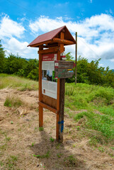 Signpost on the Muraglione Pass, a pass in the Tuscan-Emilian Apennines in the province of Florence, Tuscany, Italy, on the path of the Gothic Line and the path of the Sacred Forests.