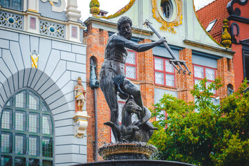 Obraz premium The Fountain of Neptune in Gdańsk is one of the oldest monuments in Poland