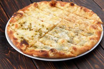 pizza on the wooden background