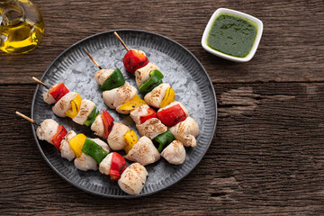 space bbq chicken stick with bell pepper on wood