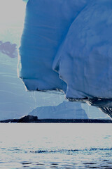Melting iceberg, falling water drops, antarctic ocean, melting ice, Antarctica