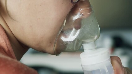 close-up mouth a woman's nose breathes with an inhaler 