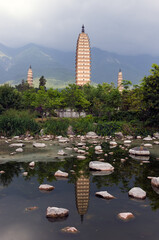 Dali three white pagodas and Cangshan Mountain - Yunnan, China.