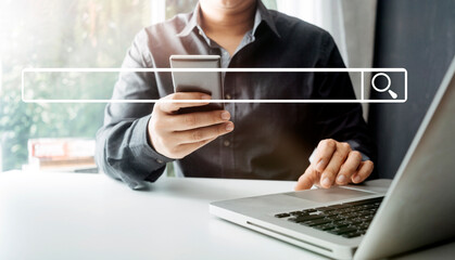 Searching Browsing Internet Data Information with blank search bar.businessman working with smart phone, tablet and laptop computer on desk in office. Networking Concept