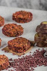 Sweet potato vegan burgers aduki light background. selective focus