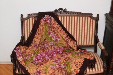 Orchid flower on vintage folk russian Pavlovo Posad shawl, scarf. Tropical flowers at home. Vintage...