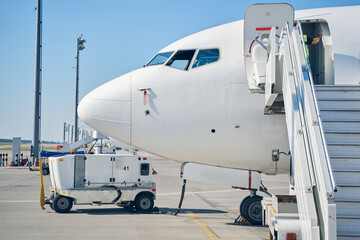 Device connected to the electrical system of an aircraft