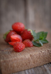 strawberries on a wooden background