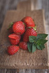strawberries on wooden background