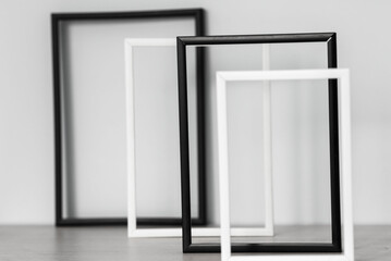 Frames in place with a mask and a leaf on a white background. Frames on a white background. Many frames. Leaves in a frame. Mask in a frame.