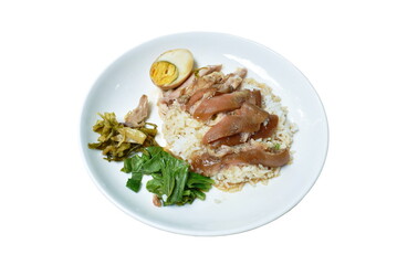 boiled pork leg slice in black Chinese herb soup with egg dipping spicy and sour chili sauce topping rice on plate