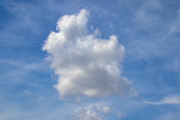 single cloud in the blue sky