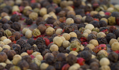 Black, white and red peppercorns mix