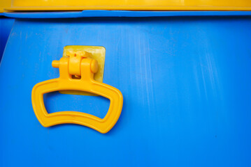 Yellow handle of a blue barrel. shot at Chinchwad in Pune on 28 NOV 2011