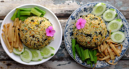 two plate of fried rice dish with vegetables for lunch, delicious vegan food ready to eat