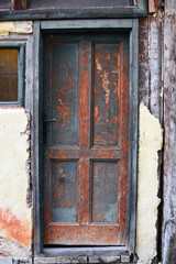 Old wooden door. Old shed exterior. Rustic texture