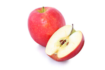 Red apple with half isolated on white