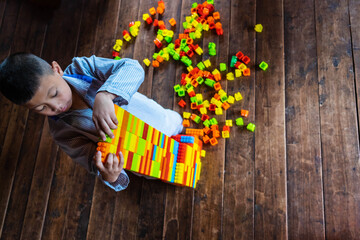 Boy playing toy puzzle