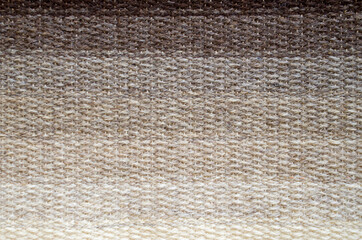 New rug in iridescent colors from ecru to brow close