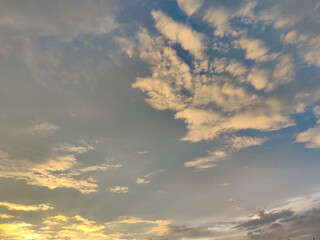 Naklejka na ściany i meble White clouds and blue sky during sunset time.Nature. Daylight.