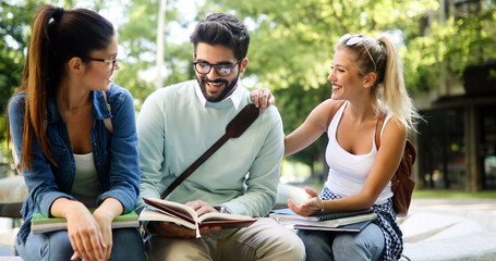 College students studying on university campus outdoor