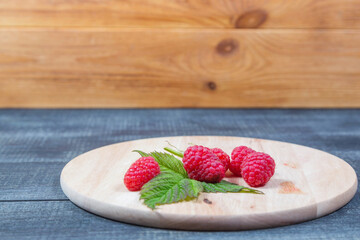 Raspberry. Health, summer. still life on wooden background.