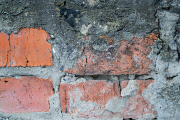 red brick wall. cracked bricks. bricks texture. curved dirty