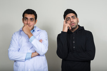 Portrait of two young Indian men as doctor and patient together