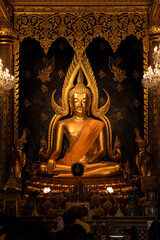 Fototapeta premium Phra Phuttha Chinnarat Buddha statue at Wat Phra Si Rattana Mahathat, Phitsanulok, Thailand