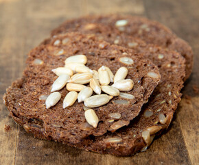 Healthy brown bread with cereals and sunflower seeds.