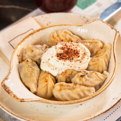 Meat meal with yogurt close up