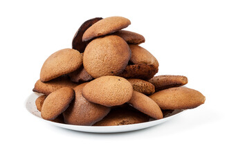 Brown homemade round shape cookies lined with a slide on a plate on a white isolated background in a photo studio. Sugar-free dietary oatmeal cookies with fructose.