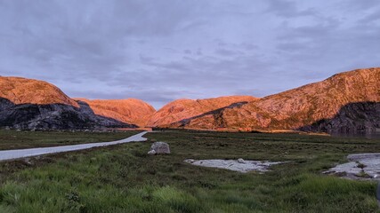 Sunset with orang color in the norwegian mountains