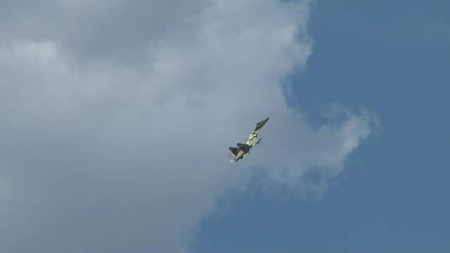Zhukovsky, Russia, August 9, 2012. Multipurpose fighter Su-35 (Flanker-E) with nozzles with deviated thrust vector performs aerobatics at minimum speed. Close-up.