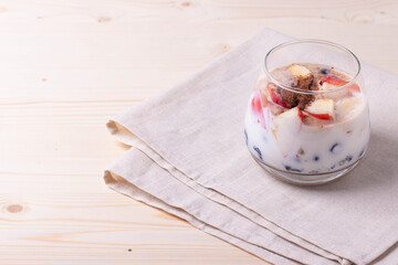 yumy milky desert or yughurt with fruit and berries