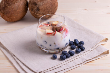 yumy milky desert or yughurt with fruit and berries