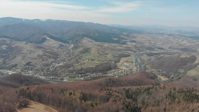 Aerial panorama of Rytro, Przysietnica and Barcice villages from Makowica in early spring. Beskids Mountains, Poland.