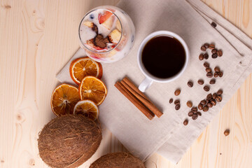 espresso in a cup and milky desert with fruit