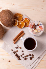 espresso in a cup and milky desert with fruit
